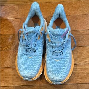 Hoka Sky Blue and Tangerine Athletic Shoes